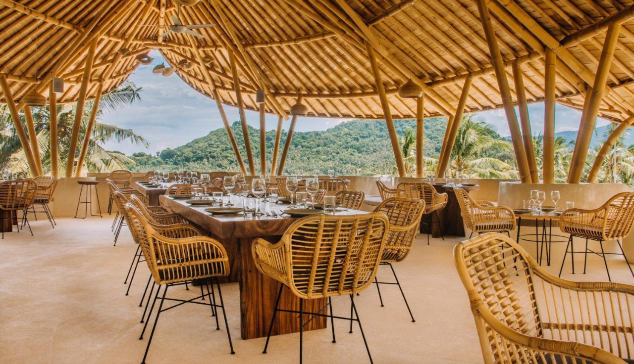 מלון Manggis Neano Escape מראה חיצוני תמונה The restaurant at the resort