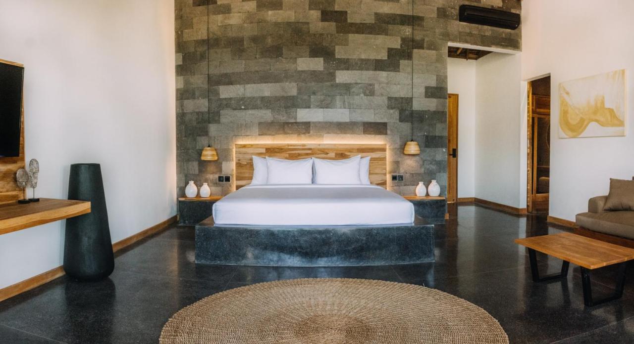 מלון Manggis Neano Escape מראה חיצוני תמונה A bedroom at the hotel