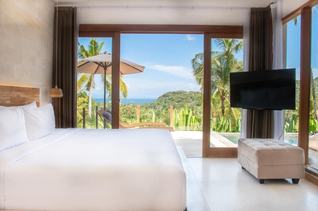 מלון Manggis Neano Escape מראה חיצוני תמונה A bedroom at the resort